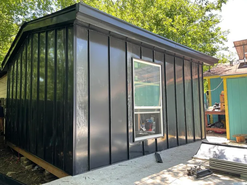 Black standing seam metal wall panels for Metal Roof Installation in Waipio