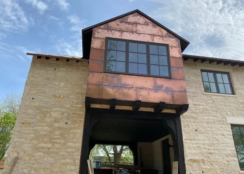Copper metal panel facade on a stone building for Metal Roof Coating in Waipio